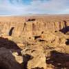 Another view from the summit, this time in the opposite direction looking past Horseshoe Bend with Page, AZ, in the background.