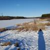 Frozen reservoir at sunset