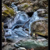 Frozen waterfalls and a rock stack at Rose River, VA.