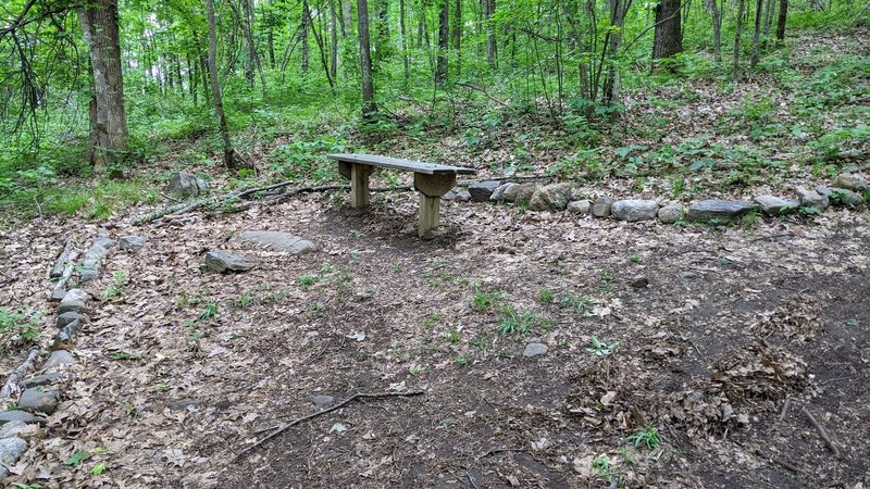 Welcoming bench at the top of a steep climb.