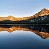 Sunset glow on Gunsight Mountain. Location is approximate.