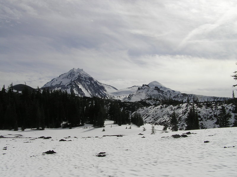 Looking southeast from trail near 4-in-1 Cone after fall snow. Collier Crater, North Sister and Little Brother (L-R).