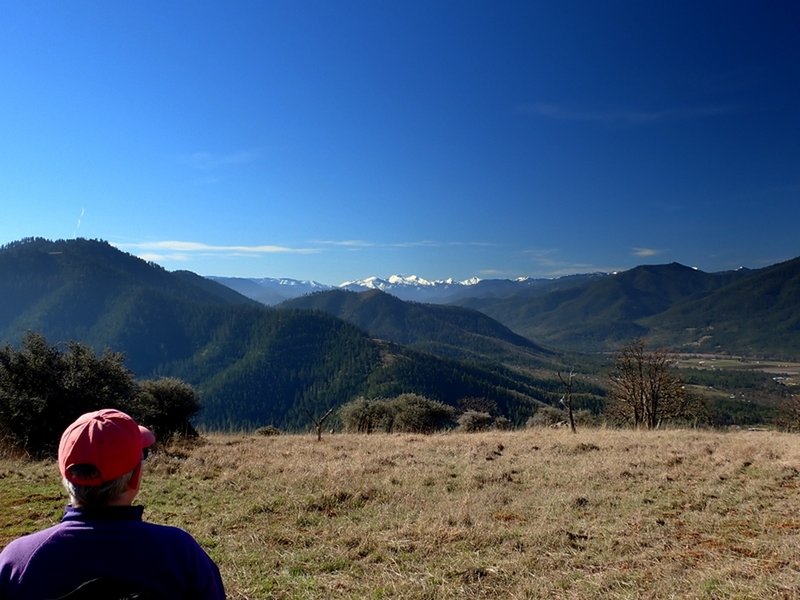 The snowy Red Buttes from where the trail runs along the ridge.