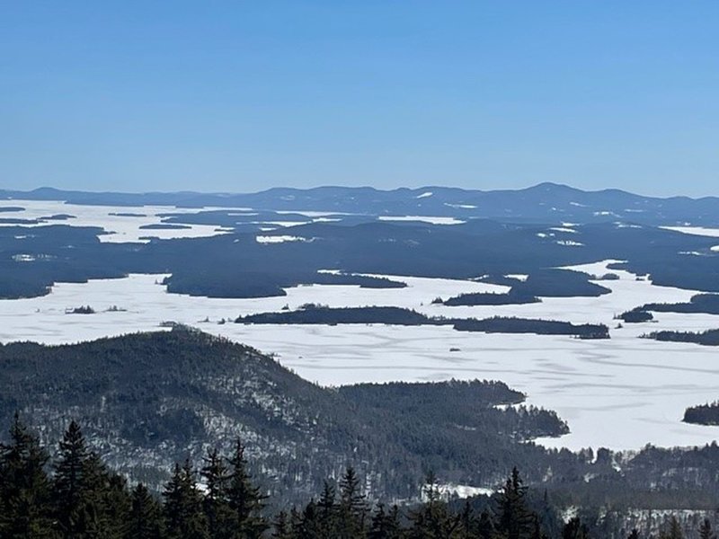 Summit in late Feb looking towards Squam, Winni is further out, Belknap Range in upper right