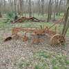 Intersection of Miles and Hermann Trails, southeast corner. One of three places with abandoned farm equipment.