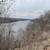 From the sidewalk, the Mississippi with the Minneapolis skyline.