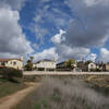 Development at the top of Side Hill viewed on a very clear day with dreamy clouds.