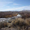 The Jordan River and the distant Oquirrh Range with snowy Flat Top Mountain in the background (center) seen on a very clear pandemic day. Latimer Point is closer, center right.