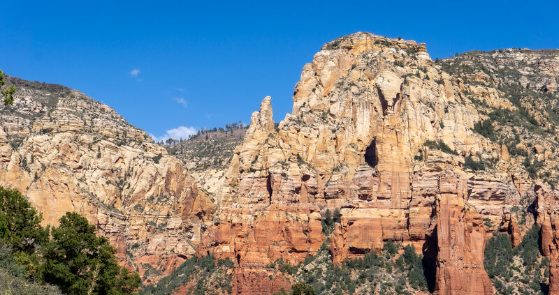 Mountains towering above from just below Brins Mesa.