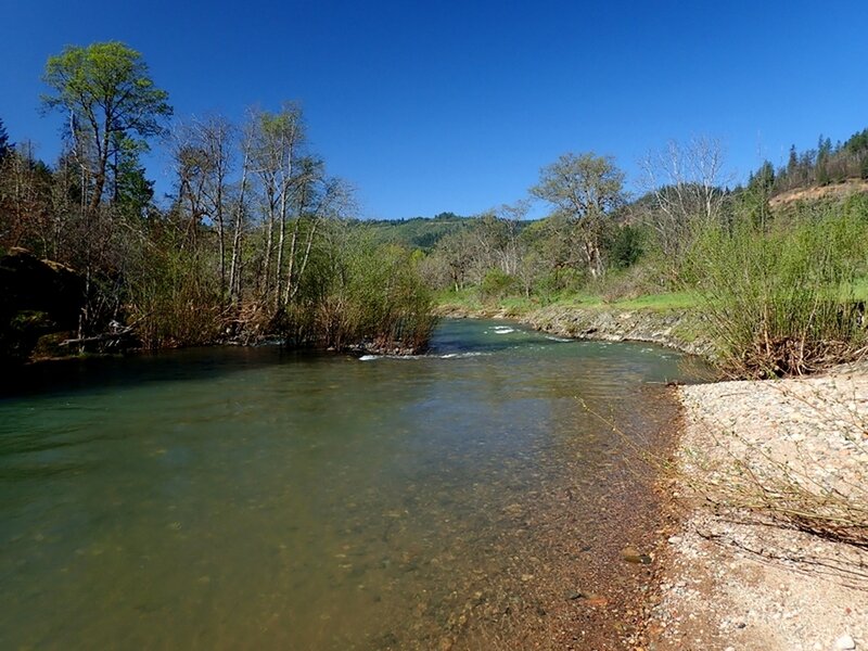 The little beach at the popular swimming/wading spot along Elk Creek.