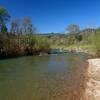 The little beach at the popular swimming/wading spot along Elk Creek.