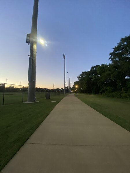 Parkerson Mill Creek Greenway between the old Auburn University intramural field (left) and Parkerson Mill Creek (right, not pictured).