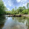 Glassy waters on the Deep River.