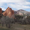 Light on the North Gateway Rock with Ormes peak in the distance (center right).