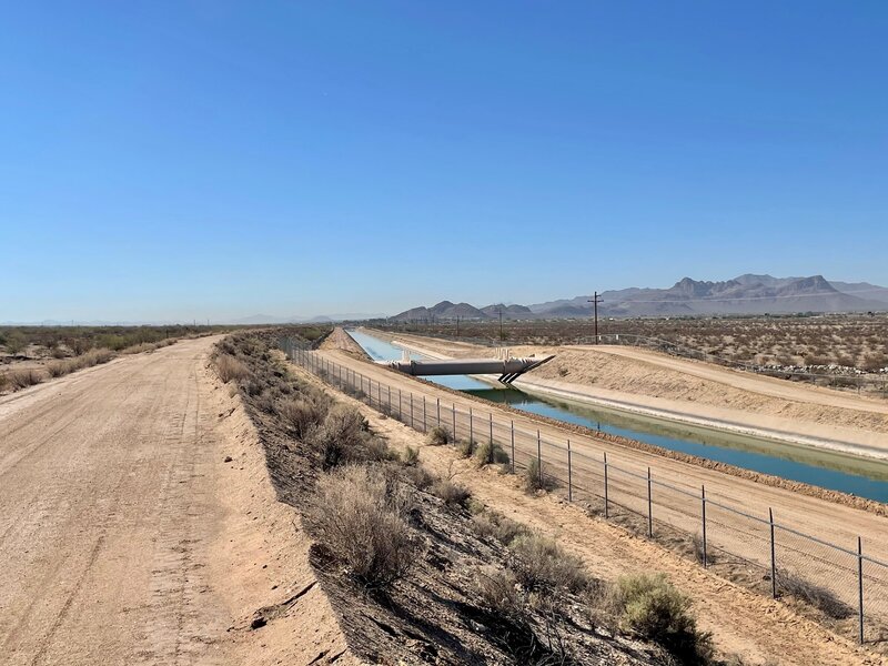 Looking SE with the CAP Trail on the left side along the CAP canal. Tucson Mountains on the right side of the shot.