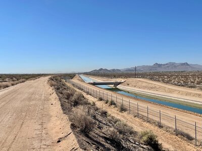 Looking SE with the CAP Trail on the left side along the CAP canal. Tucson Mountains on the right side of the shot.