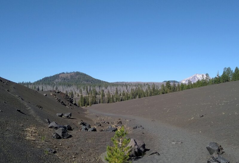 Fairfield Peak (left) and distant Lassen Peak (right), 10,457 ft., are stunning against the barren volcanic ash on the west side of Cinder Cone.