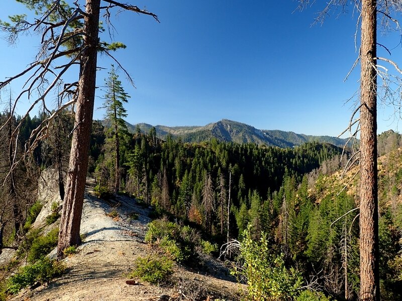 Along the narrow ridge of white rock.