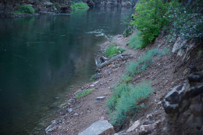 The trial ends at the riverside where you can enjoy putting your feet in the water and enjoying a break from the heat.