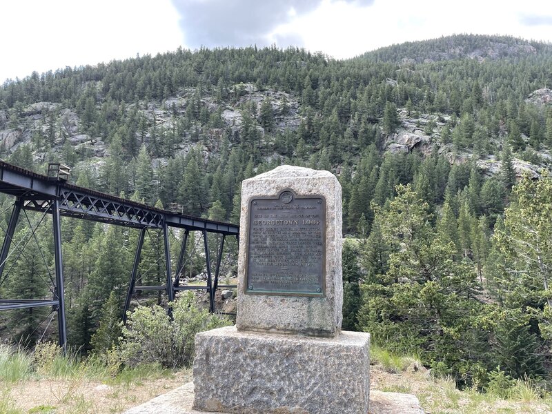 Looking up from Georgetown Trestle to trail.  Trail traverses cliff bands in background.