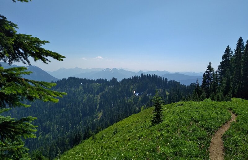 The panorama of mountains stretching into the distance to the northwest, from a high point along Cady Ridge.