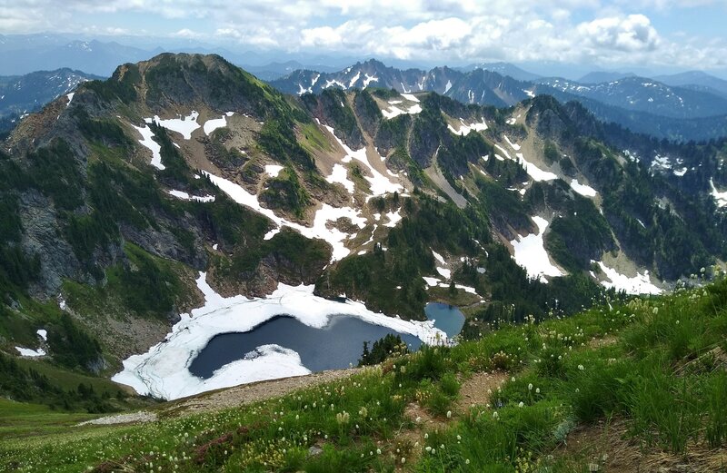 Blue Lake is far below the steep high meadows that Johnson Mountain Trail traverses.