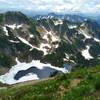 Blue Lake is far below the steep high meadows that Johnson Mountain Trail traverses.