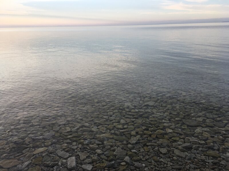 There are stairs from the lighthouse. This is the shore down the stairs.