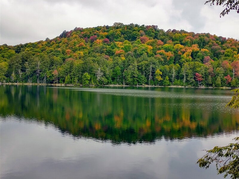 Early fall colors on Deer Pond.  Lead Pond is on the other side of this hill.