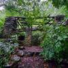 An abandoned structure that's been added on to by passersby.