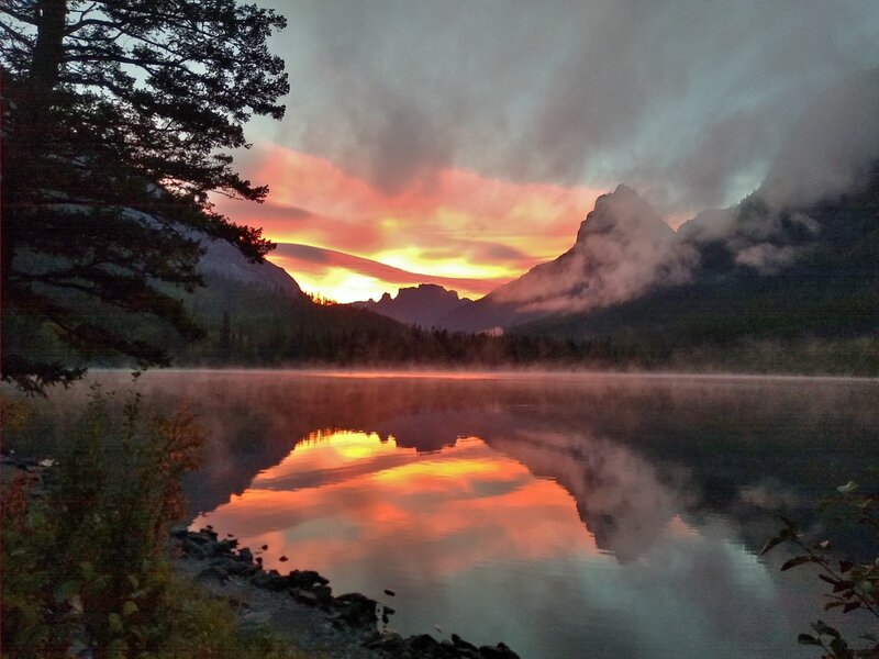 Sunrise over the east end of Kintla Lake, seen from the Kintla Lake trail camp.