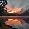 Sunrise over the east end of Kintla Lake, seen from the Kintla Lake trail camp.