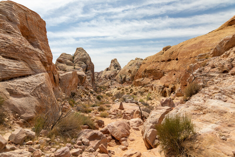 Descending from red to white rock.