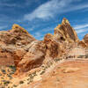 The trail leads up on the right side of the rock fin.