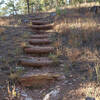 Steps climb up the hillside as the it meanders around the campground.