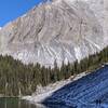 On the eastern shore of Chester Lake, hikers follow the rocky trail in the shadow of Mt. Chester.