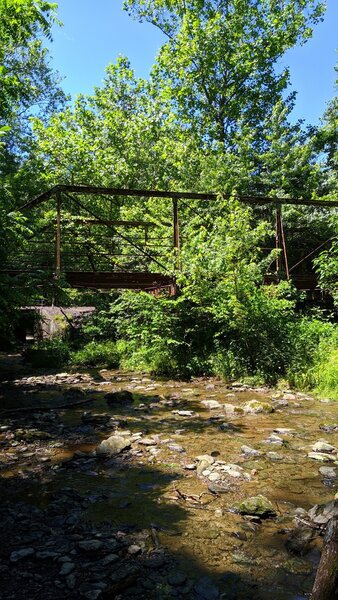 Bridge remains at the end of the abandoned maintenance road.