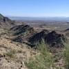 Climb the rock pile to the top where the two trails meet for a better view.