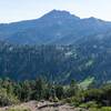 A hiker looking towards Brokeoff Mountain across the valley.