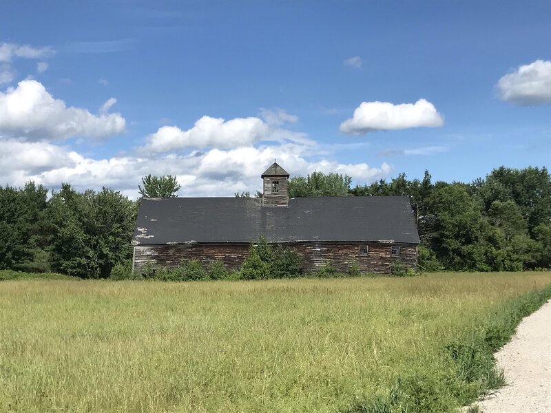 An old barn, along the pathway.