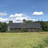 An old barn, along the pathway.