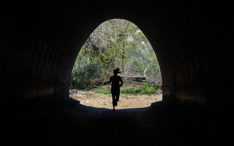 SPACEROCK Trail Race runner at the tunnel.