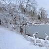 Trail along the edge of the lake with an inch of snow covering all