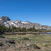 Frog Lake in front of Round Top with the last snow of the season.