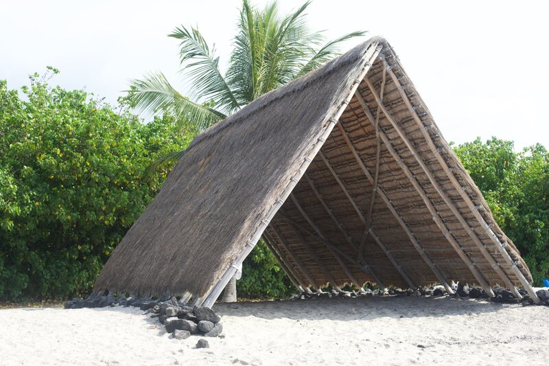 The Canoe House on the beach provides some shade and insight into Hawaiian History.