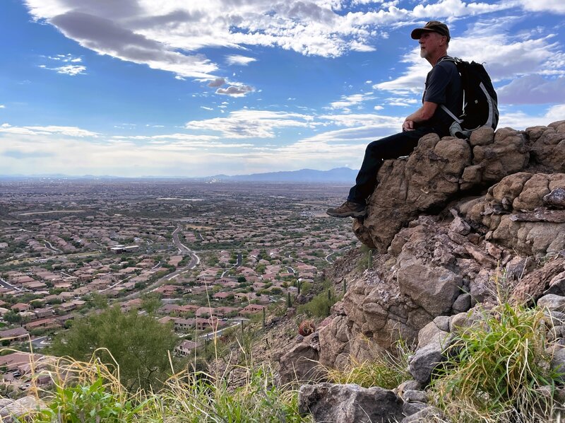 Taking a break on top to view the valley below.