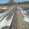 Looking north up the rail, trains still use this line.