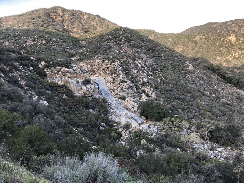 0.5 miles in you are greeted by the falls.