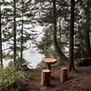 Wooden table and chairs approaching Striped Peak summit.