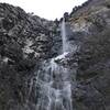 Snoquera Falls, a tall, low-flow, double drop waterfall.